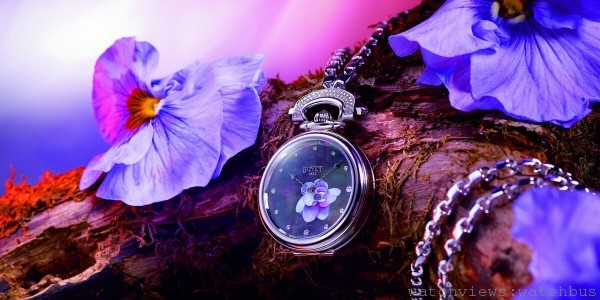 Amadeo Mille Fleurs "Ladies Touch"珍珠母貝彩繪花朵腕錶─ " 睡蓮"，18K玫瑰金Amadeo三用錶殼，錶徑39毫米，珍珠 母貝彩繪面盤，時、分顯示，11BA12自動上鍊機 芯，藍寶石水晶鏡面及透明底蓋，防水30米。