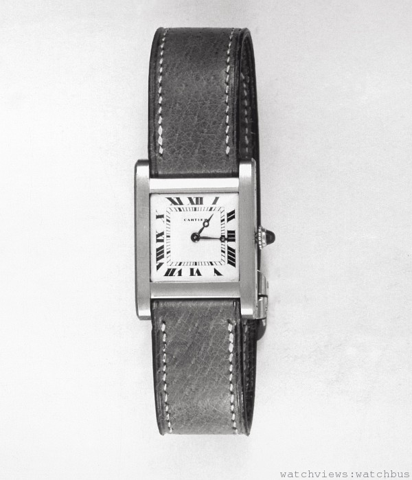 1917年，TANK坦克腕錶，搭載9法分機械機芯，金質錶殼，皮質錶帶，錶殼側邊兩條平行垂直延伸連接錶帶。白銀錶盤與羅馬數字，軌道式分鐘刻度，藍鋼蘋果型指針，錶冠鑲嵌凸圓型的藍寶水晶珠。初上市的此錶款已經具備坦克錶的所有特質。1917年問世之際正值第一次世界大戰，此錶的原型錶款在休戰期間被贈與美國歐洲遠征軍總司令約翰．潘興（John Pershing）。 