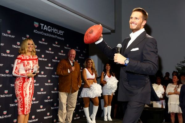 NEW YORK, NY - OCTOBER 13: (L-R) Molly Sims, Jean-Claude Biver and Tom Brady appear on stage as TAG Heuer announces Tom Brady as the new brand ambassador and launches the new Carrera - Heuer 01 on October 13, 2015 in New York City. (Photo by Astrid Stawiarz/Getty Images for TAG Heuer)